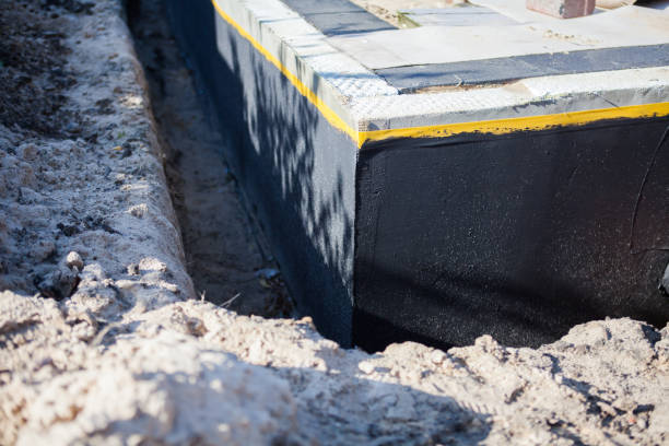 Professional Waterproofing technician working in Stroh, IN